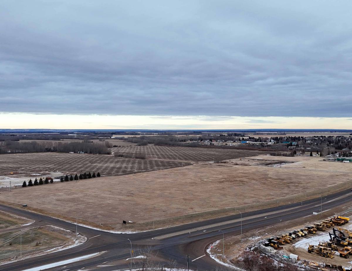 High Prairie Commercial Land for Sale – 18.96 Acres with Highway Frontage